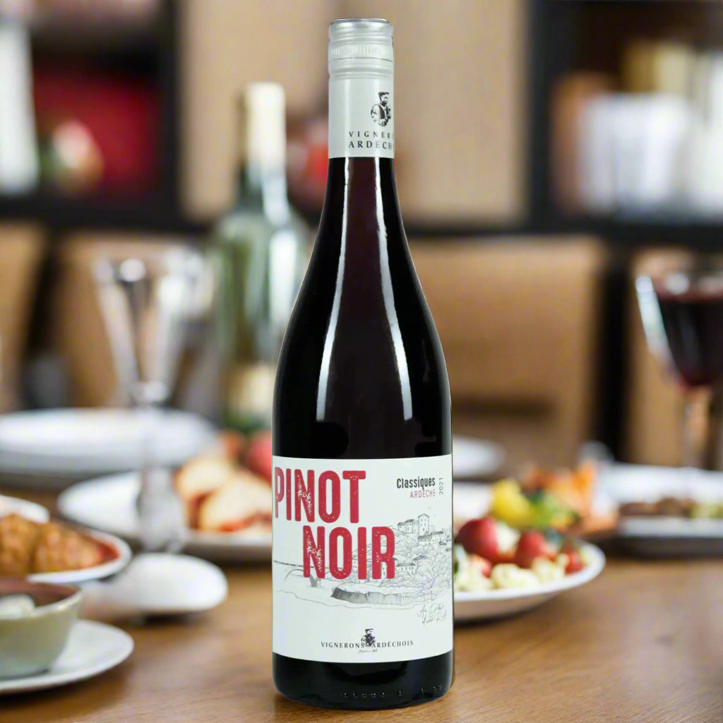 pinot Noir wine bottle with a white label on a white background with red writing in capitals