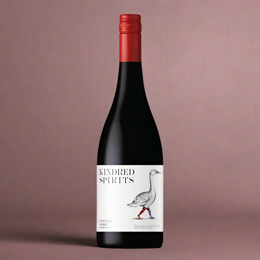 Wine bottle with a red cap and 'Kindred Spirits' label on a white background